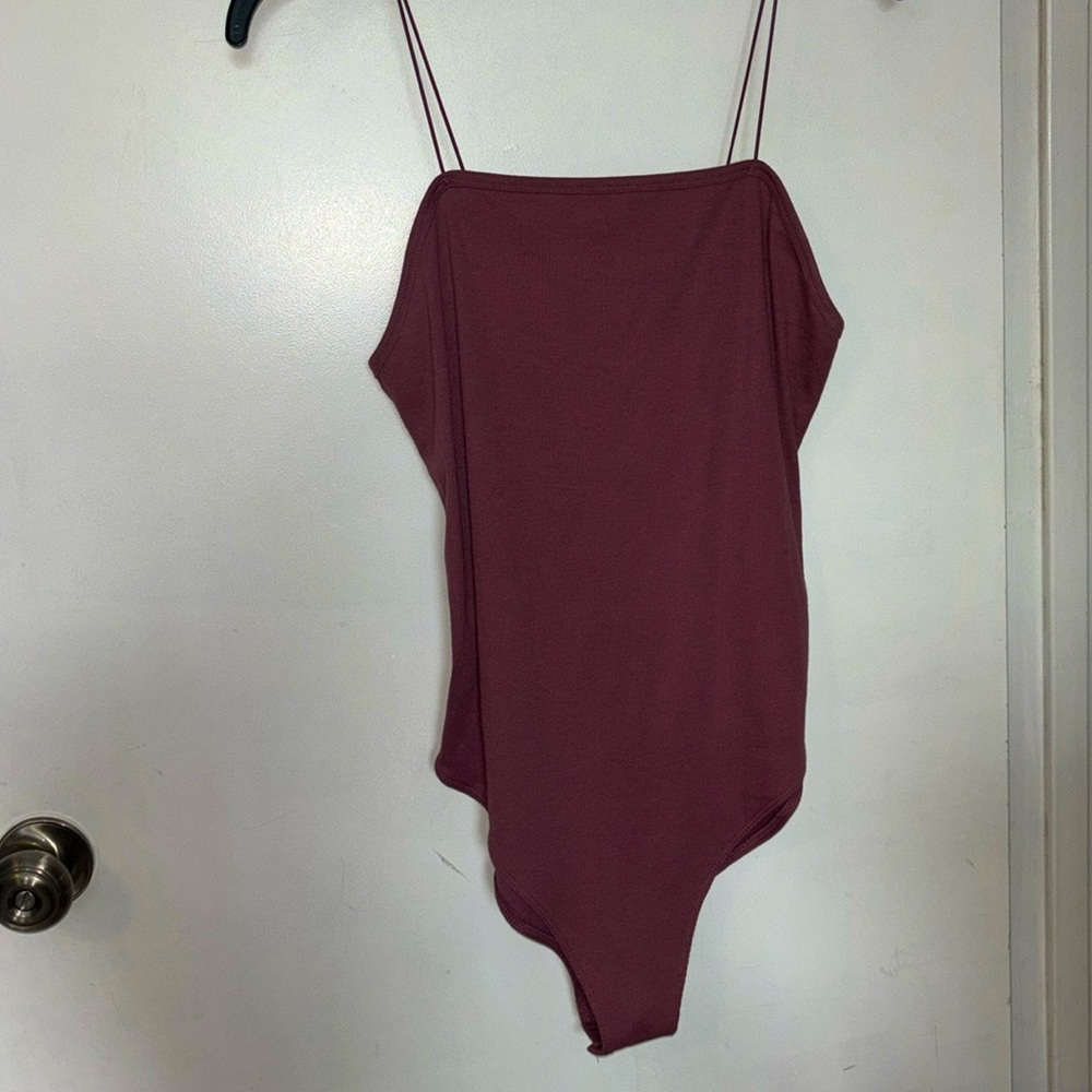 Size large mauve body suit